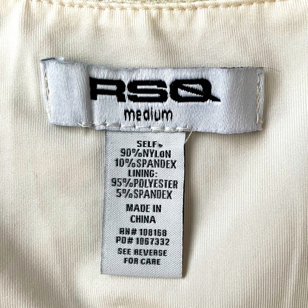 Medium cream colored tilly’s top